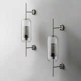 Lumivault Industrial Wandlampe | Zylindrischer Glasschirm | Eisenrahmen | Deko für Schlafzimmer & Wohnräume